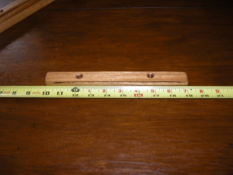 Top slide for ac power panel cover. Made from a 3' piece of 3/4" oak finish stock from Home Depot. Datto is with a Dremel tool router bit set 3/16".