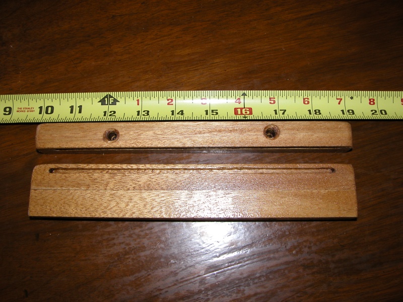 Top view of top guide. Side view of bottom guide which are 2 - 3/4"pieces glued together for the 1 1/2" height needed to clear the breaker switches.