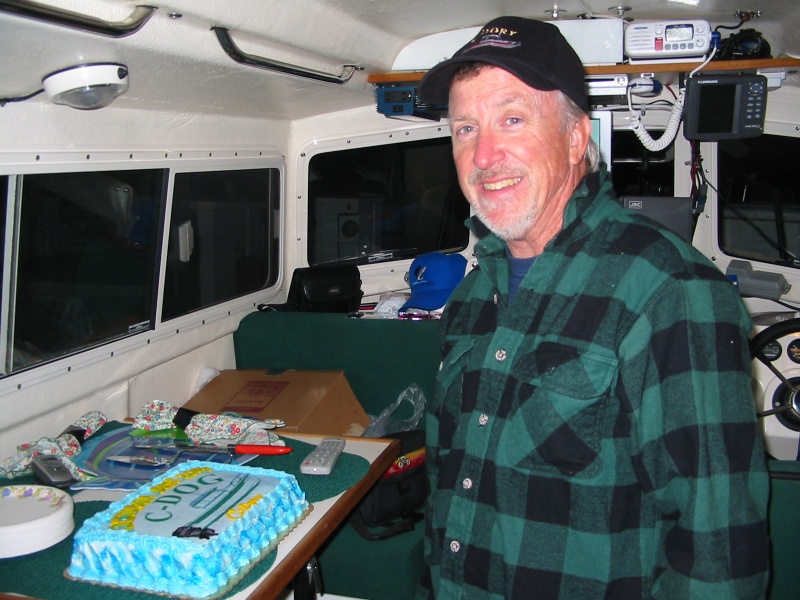 (TOPKICK) Jim cutting the cake