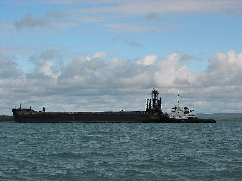 Tow boat with single barge