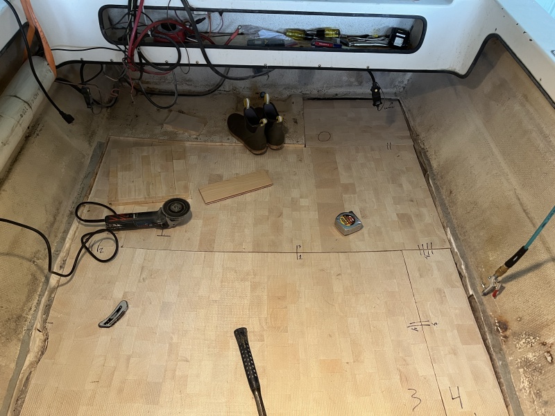 Toward transom.  Area under batteries surprisingly dry.