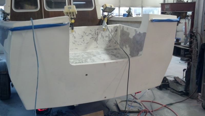 Transom Complete but the gelcoat would not bind to the West System so stripped the gelcoat off and setup to paint.
