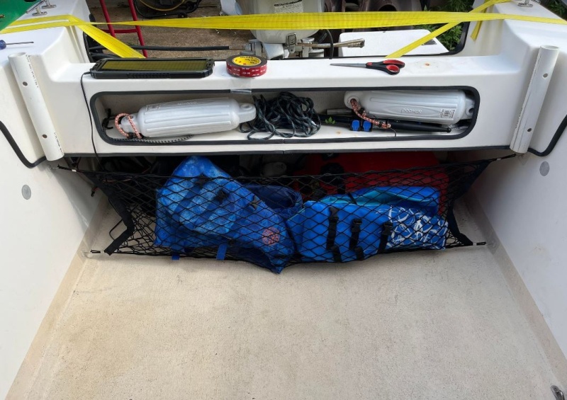 \"Trunk cargo net\" from Amazon. Is shaped like a taco so it adds a little extra storage.