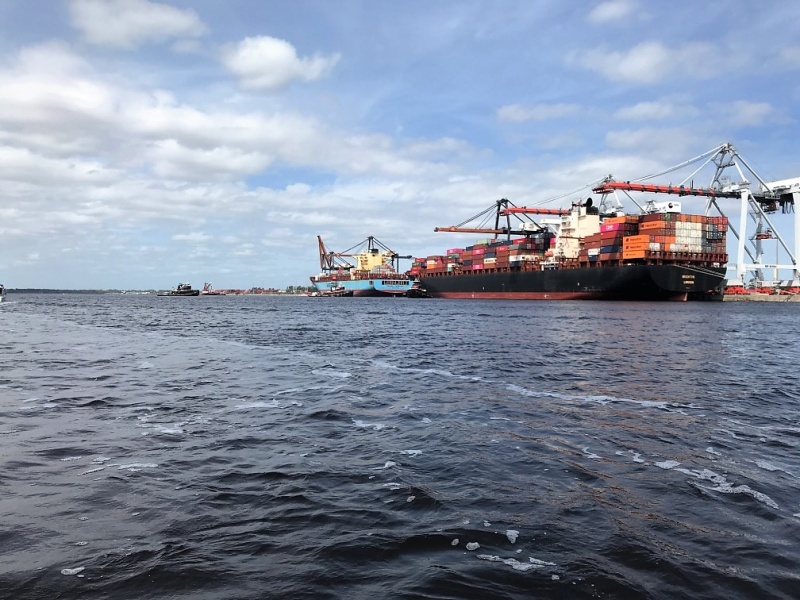 Tugs getting ready to move this ship off the dock.