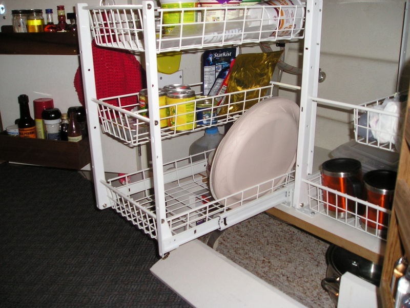 Two stacks of three pull out storage baskets