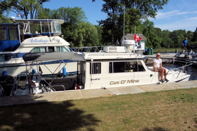Typical Canada lock wall in July-Aug.  Locals on Hoidaze just met us in the lock but invited us to stay at their private dock with power and water!   
Friendly Canada neighbors as always!
Fly your courtesy Canada flag above your US flag per custom.