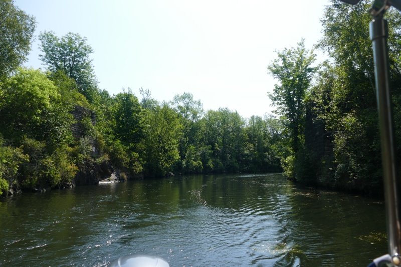 Typical Rideau canal leading to lock around  a dam and waterfall.