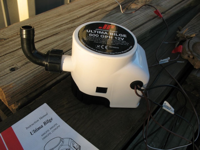 Ultima bilge pump, opened package, includes all parts and instructions, package insert.