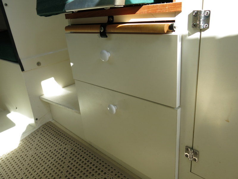 Under helm seat storage drawers