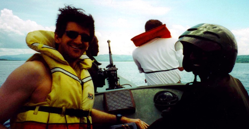 Underway again after a little toothbush repair.  Lake Kivu, Central Africa, 2001