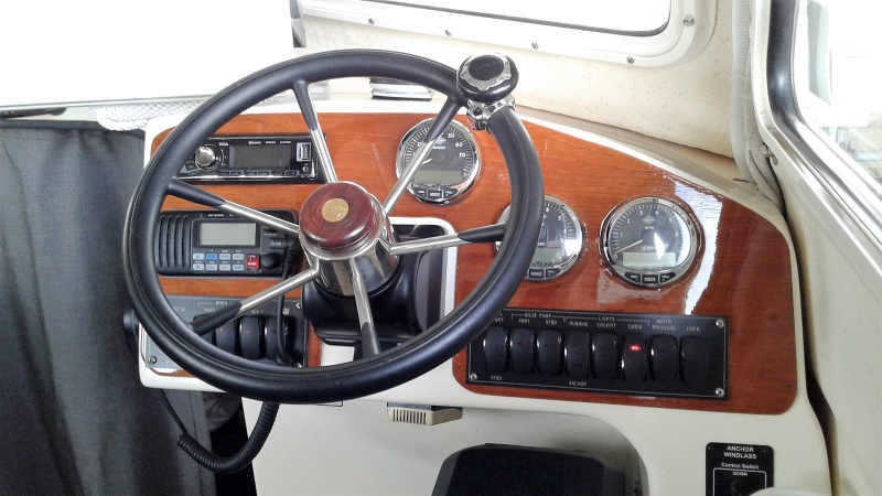 Upgraded dash...dresses up the bland "Clorox wipe" interiors of the early models that many people prefer for easy cleaning over the vinyl interiors