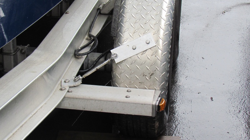 Used existing hole and bolt added the turnbuckle mounted wiith backing plate tightened up turnbuckle. Did stiffen up fenders added to front and back both sides