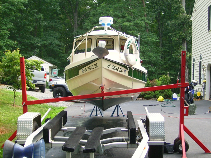 Using the G&G boat lift.  Attached to bow eye, lifted the boat off the trailer