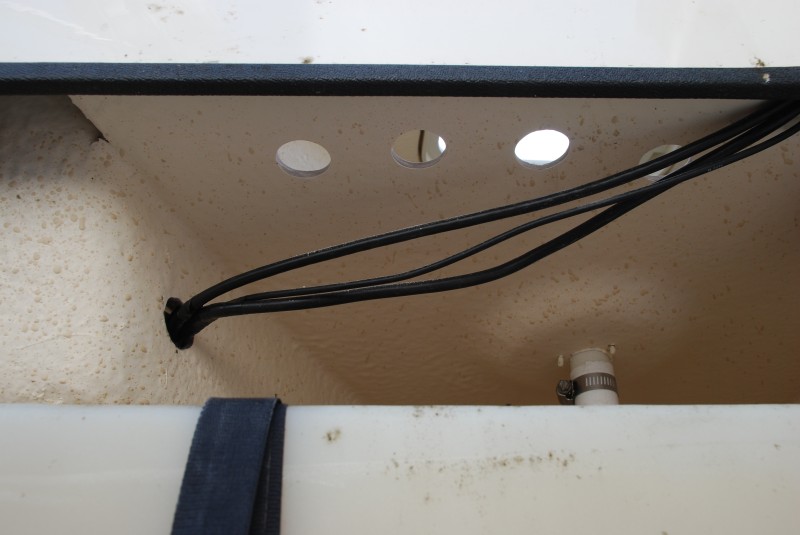 Ventilation holes, from the bottom looking aft.   Wiring is for the Lowrance fish finder.

More to come