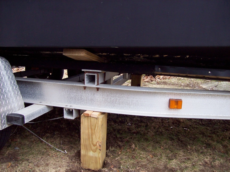 Very important to support the trailer at the load bearing points during and after the lift.  (I have 3 supports on each side of the trailer aft, just forward of amidships, and at the bow).
