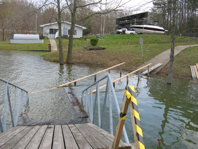 Walkways to docks are underwater from the recent rains and flooding