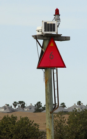 What's the yellow triangle for?