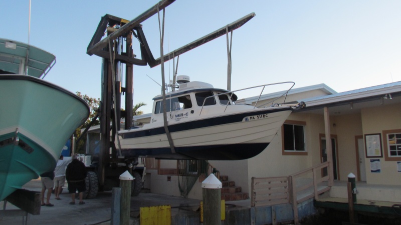 Will-C getting her bottom power washed and put back on the trailer at the Pilothouse Marina in Key Largo after a month in the water with no bottom paint. The Pilothouse 
marina was my favorite marina of the whole month long trip and we stayed in a few.