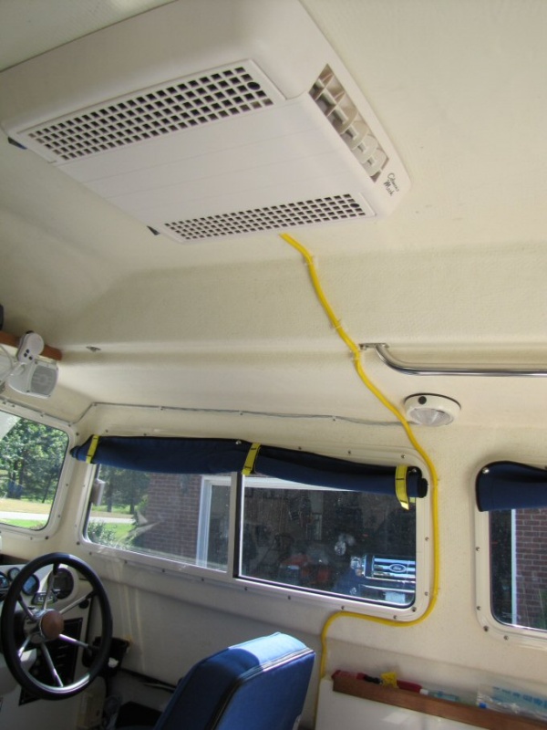 Wire tie-wrap mounts to keep cord tucked against top and side