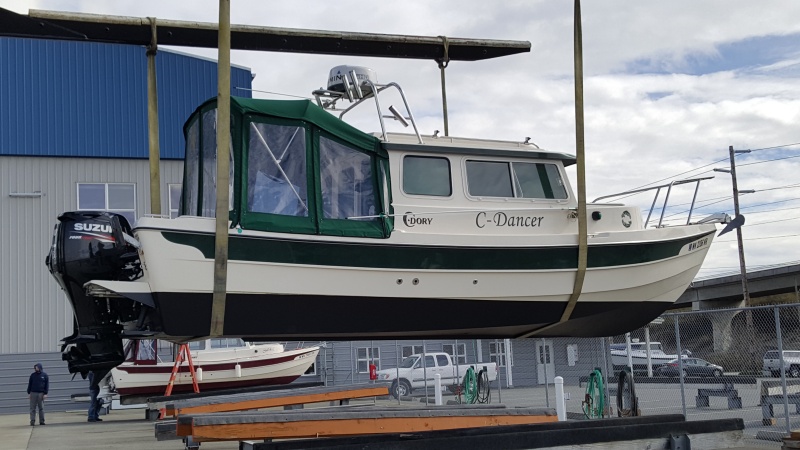 With shiny new bottom paint and brand new motor.  That's Salish-C in the background.
