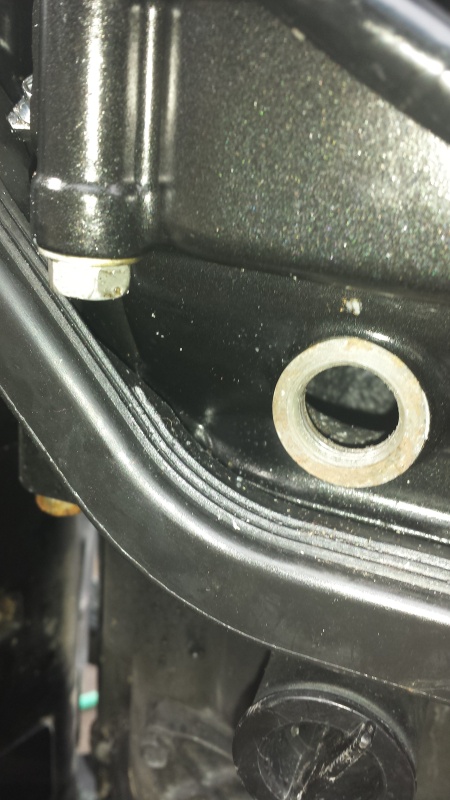 With the right tool, a hex socket, finally got the plug unscrewed.  Clean inside, no corrision!