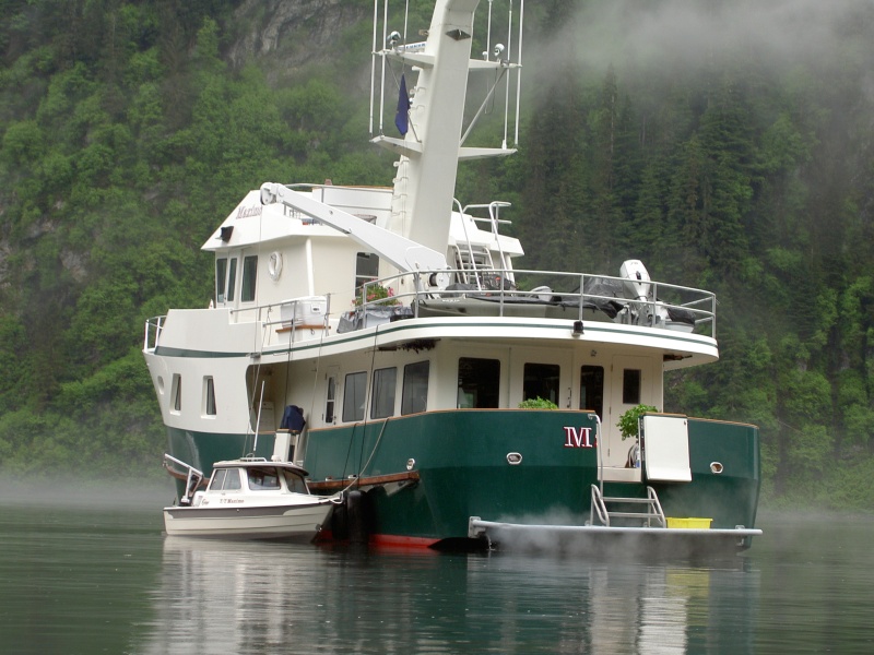yacht maximo in red bluff bay with its mokai and a c-dory tender