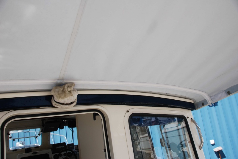 Zipper option to camper top

I really need to wash that sock cover on the backup camera.